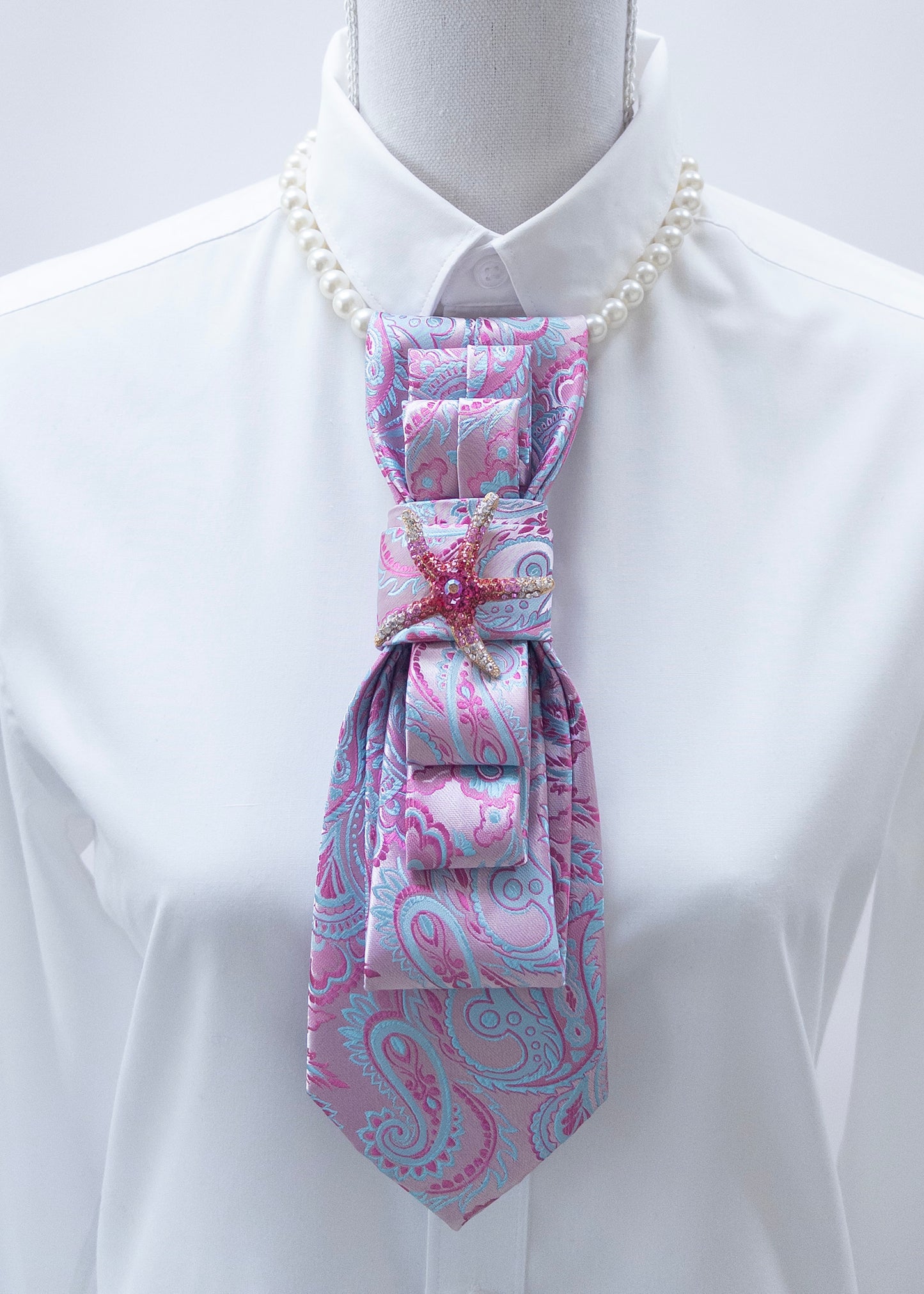 Stropdas licht roze en blauw zeester