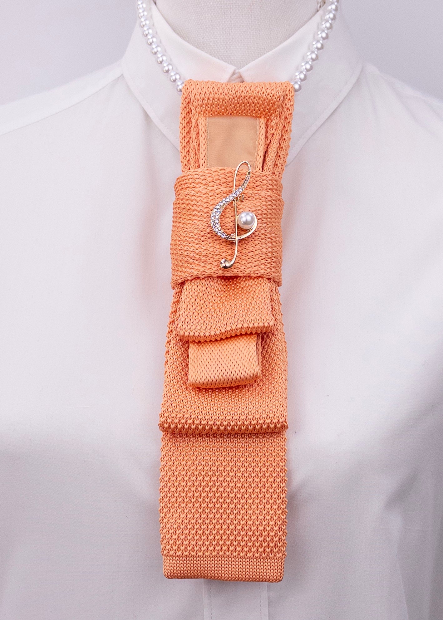 Stropdas oranje muzieknoot